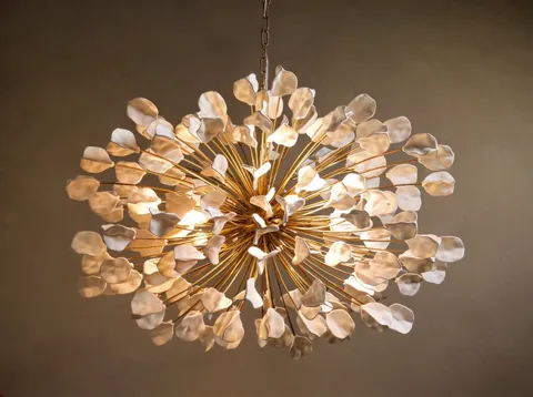 The frame shifts slightly and part of the sphere falls into shadow. The plates are not identical: each has its own curve