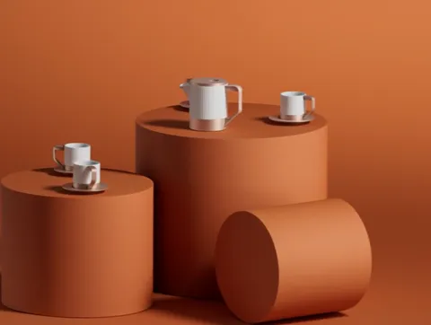 The camera shifts and the cylinders separate in depth. The proportions become clear: the cups are noticeably smaller tha