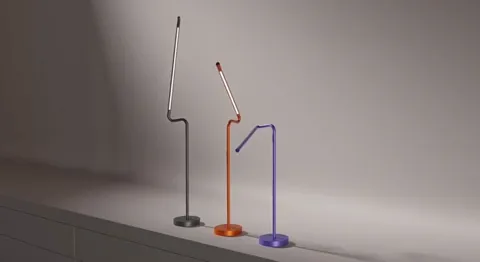 The finale: three lamps in three different poses. Ten seconds have shown the range of movement that a listing normally e
