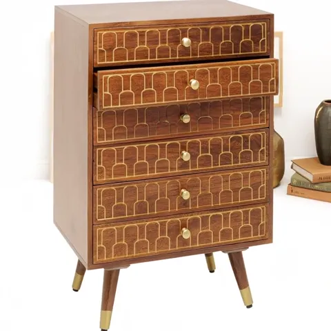 The second drawer rolls out. The depth of the carcass is visible, and the sides are plain — the pattern is on the fronts