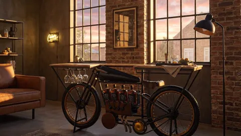 Sunset in the window, the room turning warm. The brass details on the frame light up, where in daylight they read dark.