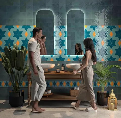 Two people enter and walk toward the basins. They supply the scale: the stars on the wall are large, roughly a palm acro
