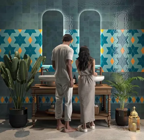 They stand at the two basins with their backs to the camera. The wall behind reads as a single composition: three horizo