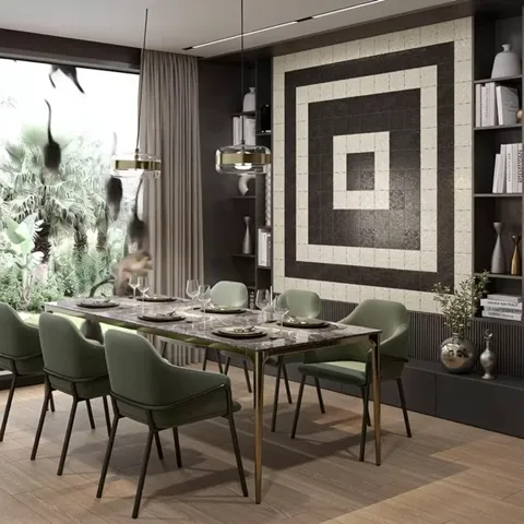 A dining room with a black and white panel filling the wall: concentric squares of tile. The table is laid, green chairs