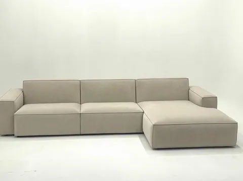 Head-on: the seams between modules read clearly, so does the back height against the arm, and the fact that the seats fo
