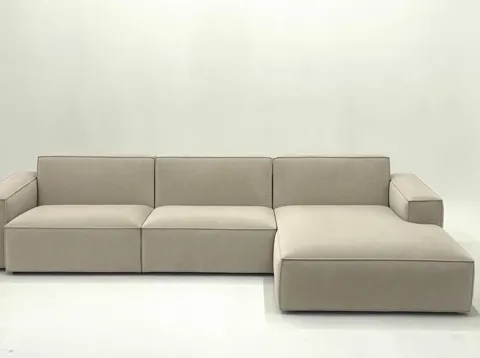 The finale from the opposite corner. Five seconds of arc have shown the sofa from every side — the buyer knows how it wi