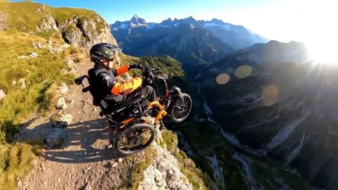 The finale: the machine at the summit, the valley behind. Eight seconds have shown this is not a medical device but a pi