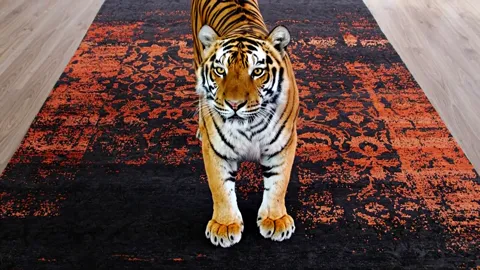 The finale: the tiger square to camera, the rug beneath it fully visible. Eight seconds have held attention on a product