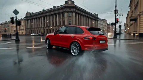 A St Petersburg square in the rain: a red crossover turns on wet cobbles, a classical colonnade behind it.