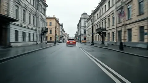 The finale: the city recedes, the car small in perspective. Eight seconds have shown the vehicle in a real urban setting