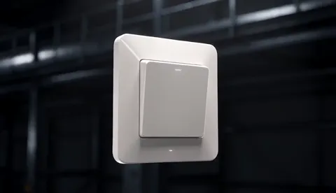 It rotates: the thickness of the plate in profile, and how flat the switch sits against a wall.