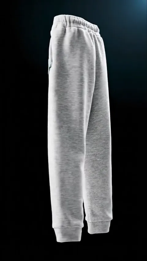 From behind, closer. The reverse of the loopback at the cuff is legible, and the elastic is sewn in rather than threaded